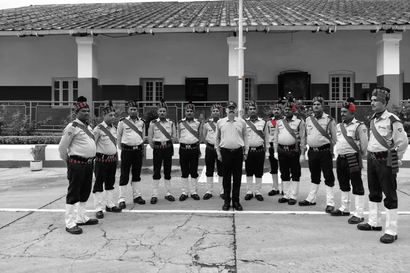Officers in line either side of their manager